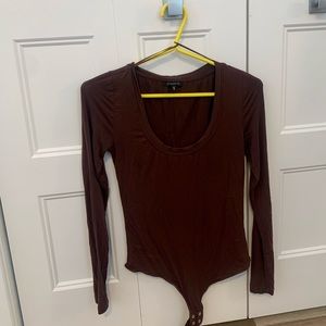 Dynamite longsleeve bodysuit